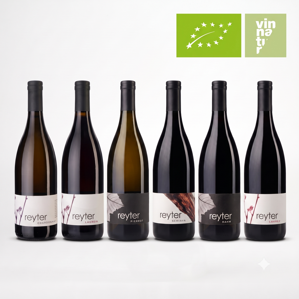 Six bottles of Reyter wine arranged in a row against a light gray background, with two green certification logos in the top right corner. The bottles are dark glass with white and gray labels featuring the Reyter brand name.