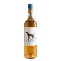 Wine bottle with a label featuring a dog silhouette in a wine cellar setting