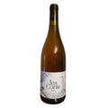 Gastine Wine bottle with 'les Cortis' label on a textured surface