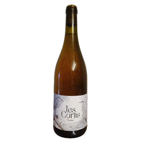 Gastine Wine bottle with 'les Cortis' label on a textured surface