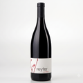 A bottle of Reyter Lakrez from the Loire Valley, featuring a dark glass body, black foil, and a white label with red floral accents, set against a clean white background.
