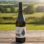 Wine bottle on a wooden surface with a scenic background