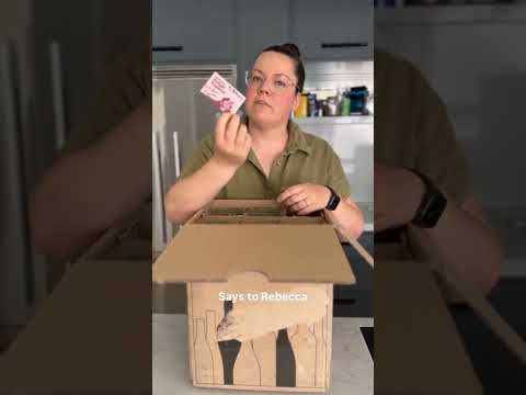 Bar owner unboxing a Karma Village organic wine case, direct from independent French winemaker Raf Raybois