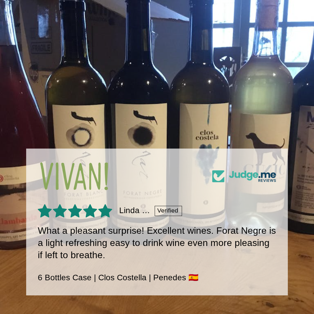 Bottles of wine with visible labels on a wooden surface, featuring a rating overlay from Judge.me Reviews.